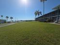 A lovely condominium complex with a view of the water and a sprawling green lawn at 1600 W Lake Parker Dr # D5, Lakeland, FL 33805