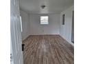 Inviting living room featuring new floors and natural light at 444 Sunnyview Cir, Orlando, FL 32810