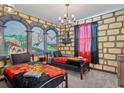 Themed bedroom features a custom mural, castle accents, and detailed decor for a magical experience at 2805 Bookmark Dr, Kissimmee, FL 34746