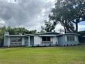 Inviting single-story home with freshly landscaped flower beds at 3107 Troy Dr, Orlando, FL 32806