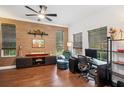 Comfortable home office with wood floors, designer touches, and natural light at 3616 Deer Oak Cir, Oviedo, FL 32766