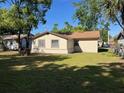 Spacious backyard, featuring a large grassy area perfect for outdoor activities at 2617 S Marshall Ave, Sanford, FL 32773