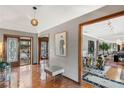 Inviting foyer with parquet floors and views into multiple living spaces at 9676 Wild Oak Dr, Windermere, FL 34786