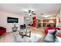Spacious living room with neutral color palette and plenty of natural light at 870 Darwin Dr, Altamonte Springs, FL 32701