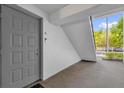 Condo front entrance featuring a gray door marked with unit number 41 at 8217 Sun Spring Cir # 41, Orlando, FL 32825