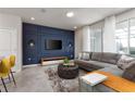 Cozy living room with modern decor, comfortable seating, and ample natural light at 977 Paradise Dr, Davenport, FL 33897