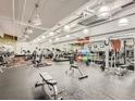 Well-equipped gym with treadmills, weights, and fitness equipment for a complete workout experience at 101 S Eola Dr # 1209, Orlando, FL 32801