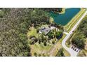Beautiful estate with a lake view, mature trees, and a secluded setting at 5200 Carson St, St Cloud, FL 34771