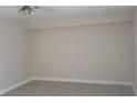 Spacious bedroom offering neutral walls and tile flooring at 5334 Bamboo Ct # 463, Orlando, FL 32811