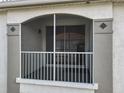 Exterior view of the screened-in outdoor balcony offers a relaxing outdoor space at 2615 Maitland Crossing Way # 9 307, Orlando, FL 32810