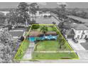 Aerial view of property highlighting the lot lines, landscaping, and surrounding neighborhood at 2565 Brookshire Ave, Winter Park, FL 32792