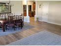 The dining room has hardwood floors and is open to the kitchen at 3020 Norlina St, Deltona, FL 32738