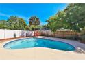 Relaxing backyard pool with mature trees and privacy fence is perfect for outdoor enjoyment at 426 S Lakemont Ave, Winter Park, FL 32792