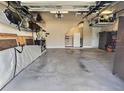 Spacious two-car garage with ample storage space and plenty of room for vehicles and gear at 8225 Corkfield Ave, Orlando, FL 32832