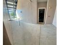 Inviting condo entrance with a black door and stair access at 3344 Corona Village Way # B4, Orlando, FL 32835