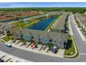 Townhouse community with pond and easy access to parking at 4730 Coral Castle Dr, Kissimmee, FL 34746