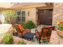 Welcoming front porch features comfortable seating and charming decorative accents at 1157 Duncan Dr, Winter Springs, FL 32708