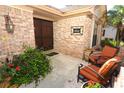 Cozy front porch with seating and decor, creating a warm and inviting outdoor space at 1157 Duncan Dr, Winter Springs, FL 32708