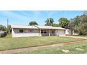 Charming home with brick accents and well-maintained landscaping at 1109 Beatrice Dr, Orlando, FL 32810