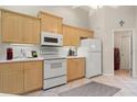 Functional kitchen featuring ample cabinet space and modern appliances at 1330 Broken Pine Rd, Deltona, FL 32725