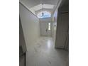 Elegant foyer with high ceilings, clerestory window, and stylish marble flooring at 1538 Brookebridge Dr, Orlando, FL 32825