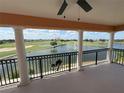 An impressive view from the balcony overlooking the golf course and lake at 1554 Corolla Ct, Reunion, FL 34747