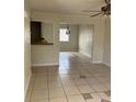 Open-concept living area featuring tiled floors, neutral paint, and a ceiling fan at 247 Debora Ct # 1, Altamonte Springs, FL 32701