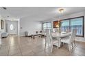 Bright living and dining area featuring tile flooring and ample natural light at 300 Augustine Ct, Oviedo, FL 32765