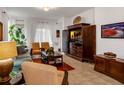 Cozy living room with stylish decor and comfortable seating at 1390 Harbor Ridge Dr, Kissimmee, FL 34759