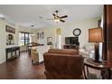 Open concept living and dining area with tile floors, neutral paint, and lots of natural light at 11041 Se 169Th Pl, Summerfield, FL 34491