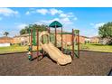 Community playground featuring a slide and other equipment offers children a fun and active outdoor space at 480 Banyon Tree Cir # 100, Maitland, FL 32751