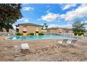 Enjoy the community pool with lounge chairs, perfect for relaxing on sunny days at 480 Banyon Tree Cir # 100, Maitland, FL 32751