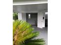 Spacious garage with white walls and ample storage space at 769 Avenue Q Se, Winter Haven, FL 33880