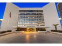 Beautiful entrance to the Aliki Atrium condo building, showcasing elegant architecture at 901 S Atlantic Ave # 3, Ormond Beach, FL 32176