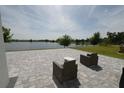 Paver patio with lake view perfect for outdoor relaxation and entertaining at 2183 Brillante Dr, St Cloud, FL 34771