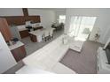 Open-concept living space with a modern kitchen and inviting living area at 2183 Brillante Dr, St Cloud, FL 34771