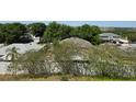 The backyard with a white fence offers ample privacy and seclusion at 2018 Knollcrest Dr, Clermont, FL 34711