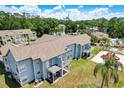 Community with beautiful landscaping, pond, pool, and playground at 2028 Royal Bay Blvd # 85, Kissimmee, FL 34746