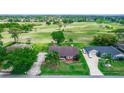 Spacious home with an expansive backyard and views of a nearby golf course at 2621 Ardon Ave, Orlando, FL 32833