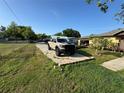 View of the driveway with ample parking space in front of the property at 1221 Perkins Rd, Orlando, FL 32809