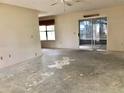 Spacious living room area with sliding glass doors and ample natural light at 307 Santa Clara Cir, Lady Lake, FL 32159