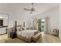 Bright bedroom with large windows and neutral decor at 6301 Parson Brown Dr, Orlando, FL 32819