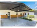 Spacious carport with ample covered parking and stylish exterior design at 3204 Tradewinds Trl, Orlando, FL 32805