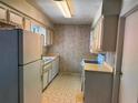 Traditional kitchen with white cabinets and appliances awaiting personal touches at 871 Darwin Dr, Altamonte Springs, FL 32701