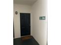 The unit entry features a black front door and a unit number sign at 2549 Maitland Crossing Way # 306, Orlando, FL 32810