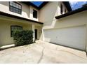 Two-story home with a two car garage and tile roof at 2840 Roccella Ct, Kissimmee, FL 34747