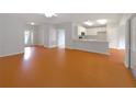Spacious open-concept living room offers seamless flow and abundant natural light, great for entertaining at 9665 Se 125Th Ln, Summerfield, FL 34491