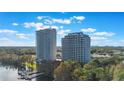 High-rise condo complex with stunning water views and private dock at 13415 Blue Heron Beach Dr # 208, Orlando, FL 32821