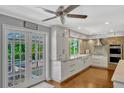 Bright kitchen with white cabinets and stainless steel appliances at 1710 Alvarado Ct, Longwood, FL 32779