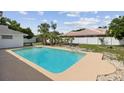 Backyard in-ground pool with plenty of space for outdoor enjoyment and entertaining at 3994 Irma Shores Dr, Orlando, FL 32817